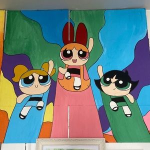 Power pull girl painting on cardboard